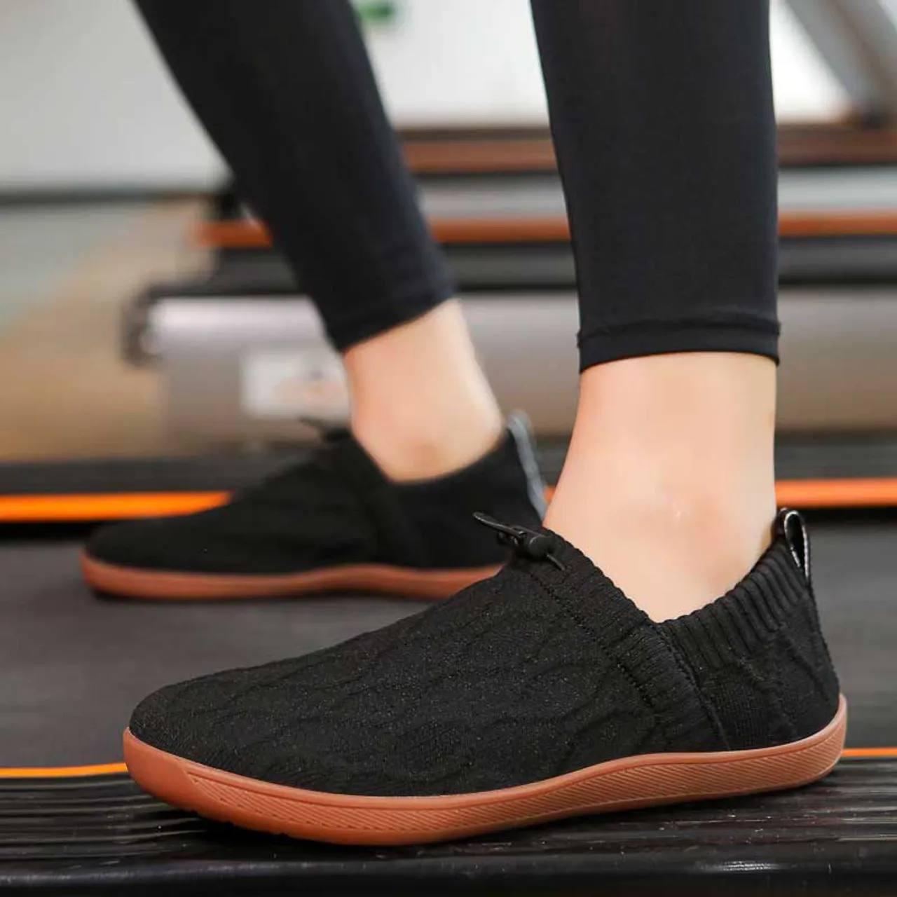 Black flyknit pattern shape slip on shoe sneaker