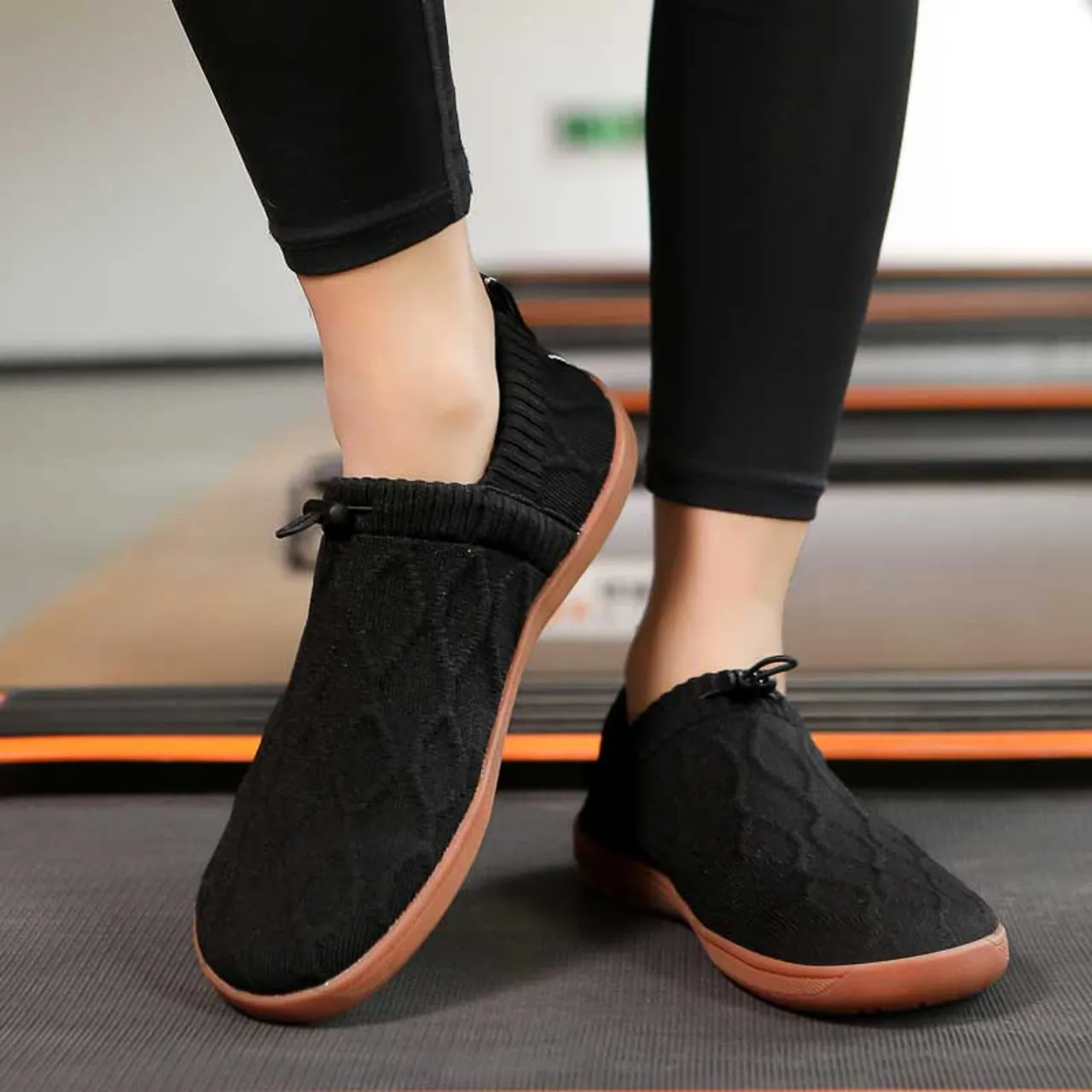 Black flyknit pattern shape slip on shoe sneaker