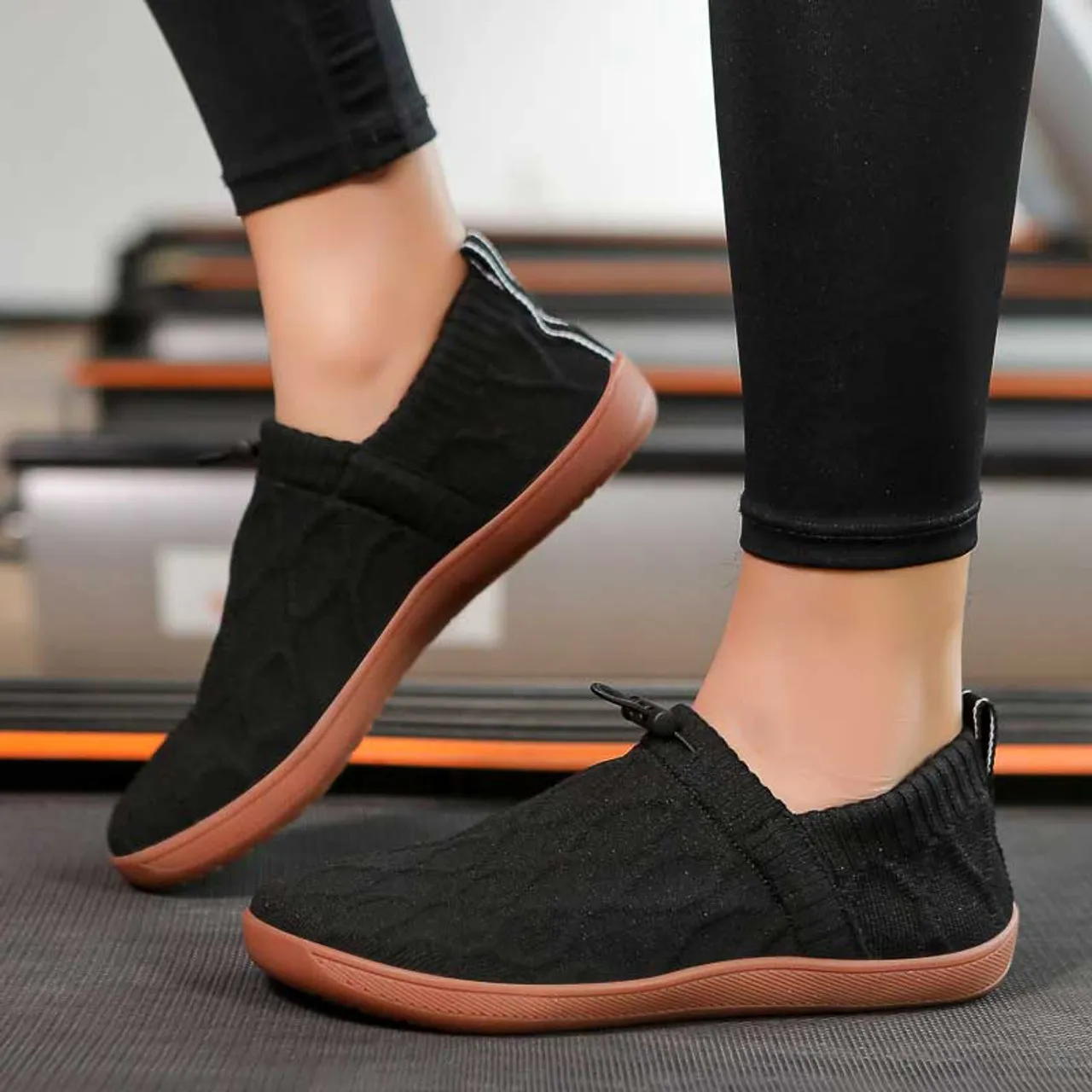 Black flyknit pattern shape slip on shoe sneaker