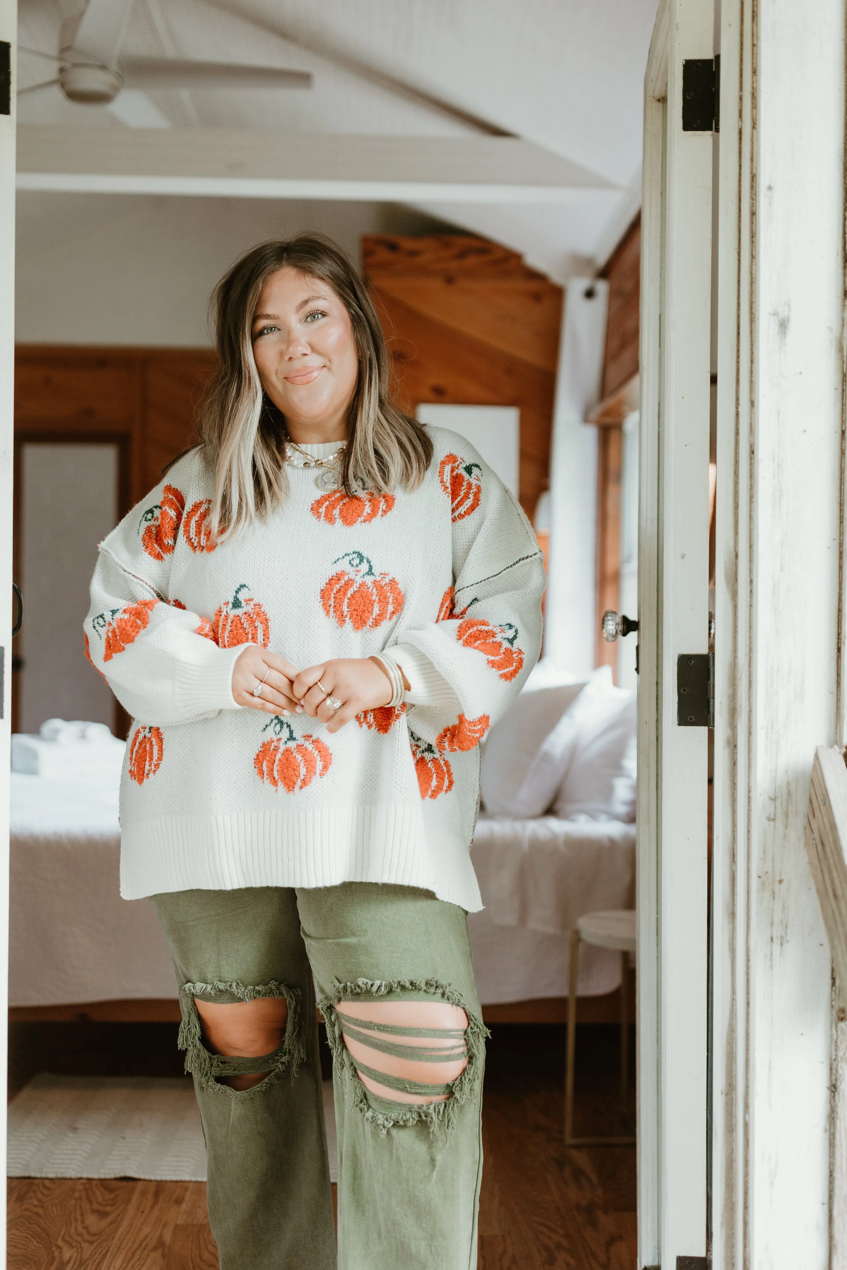 Cream and Orange Pumpkins All Over Sweater