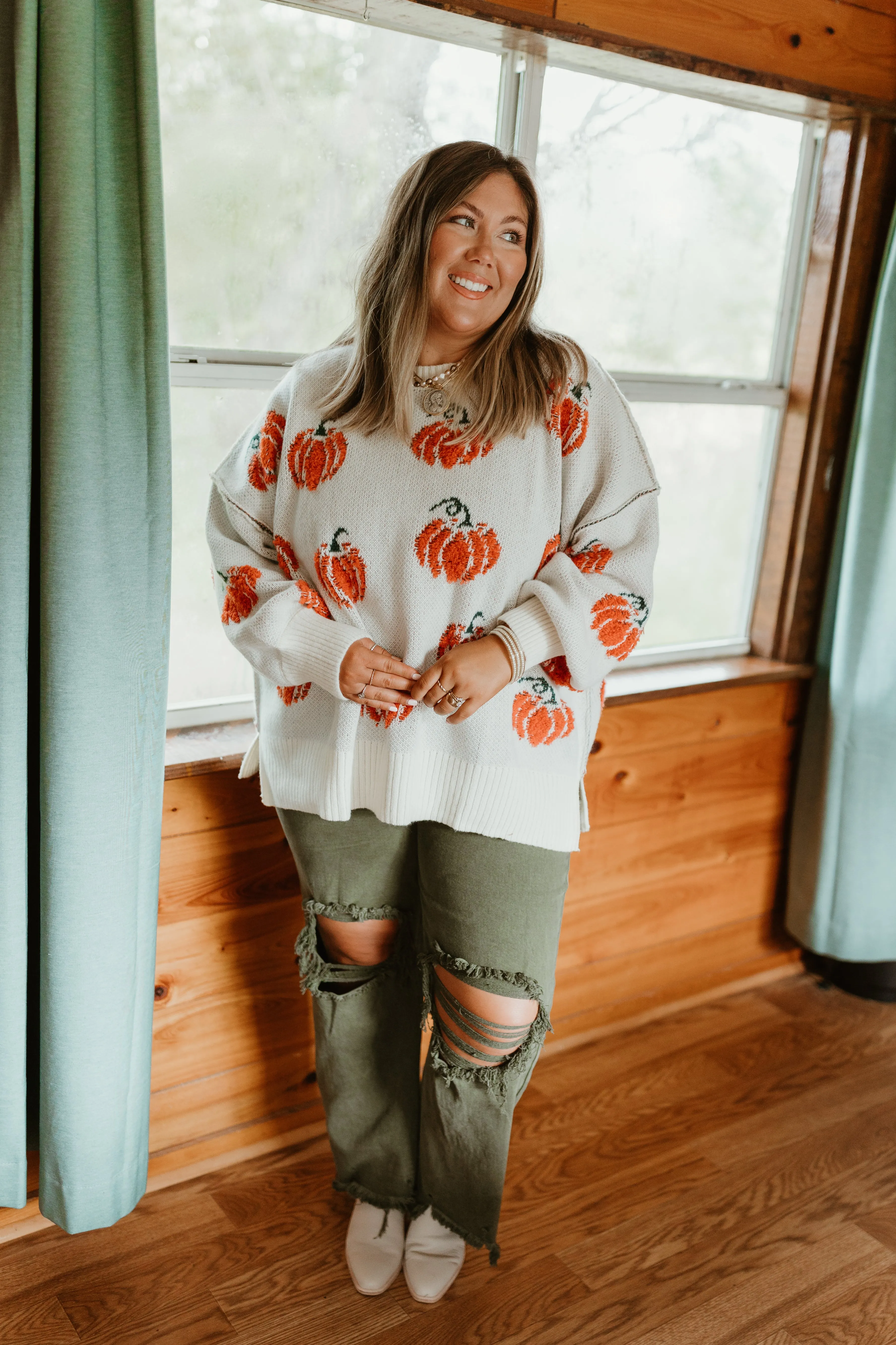 Cream and Orange Pumpkins All Over Sweater