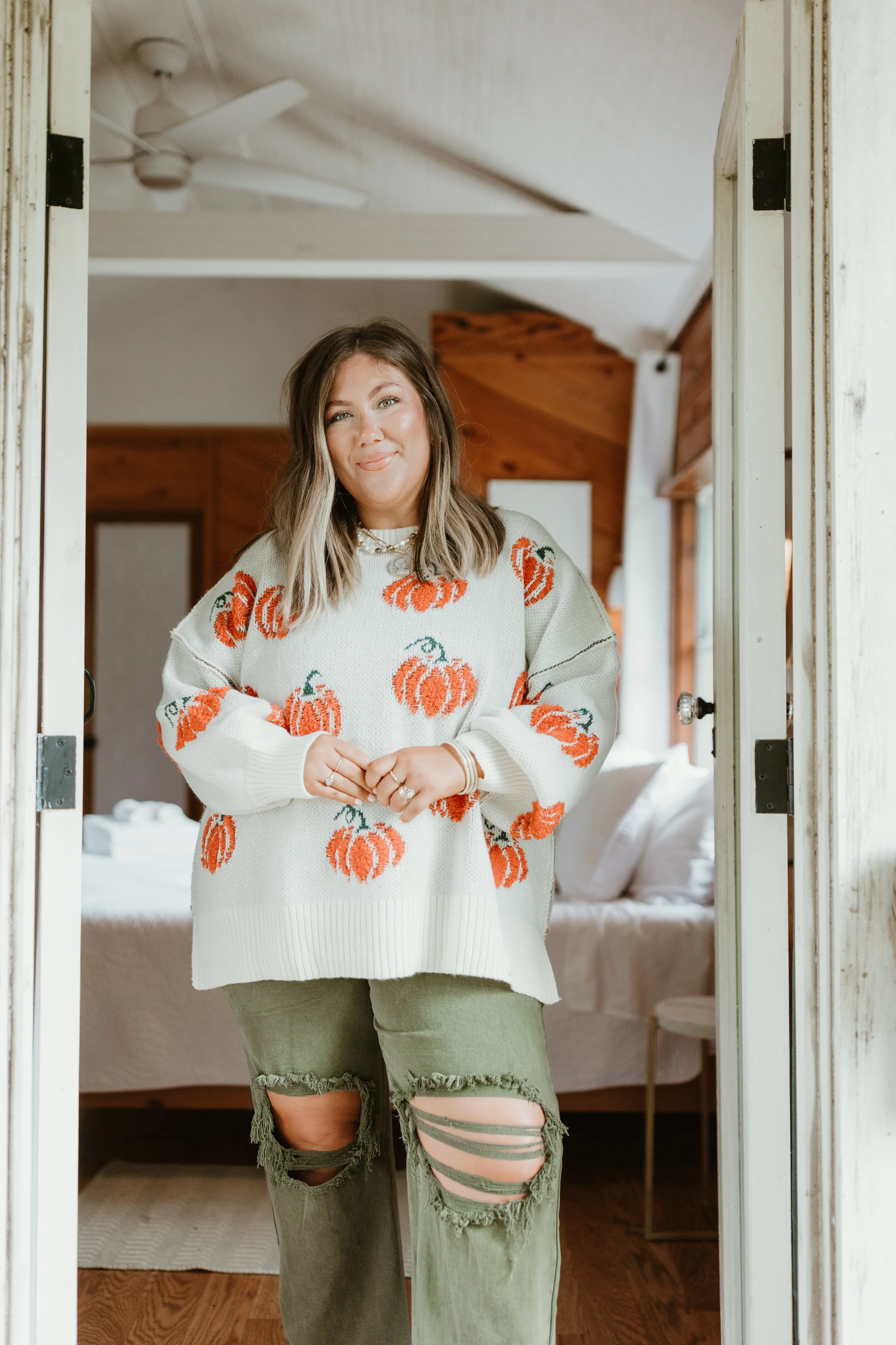 Cream and Orange Pumpkins All Over Sweater