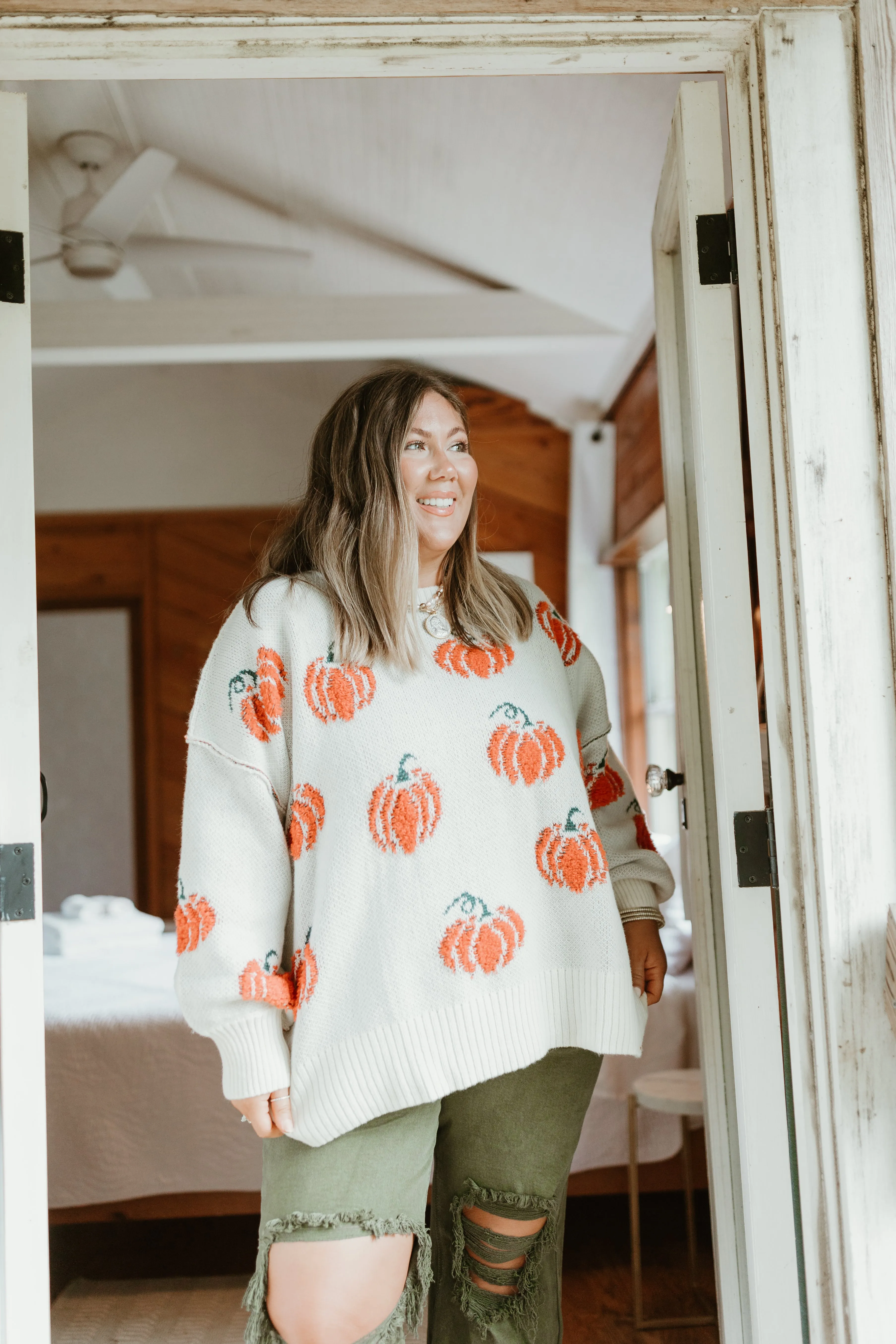 Cream and Orange Pumpkins All Over Sweater