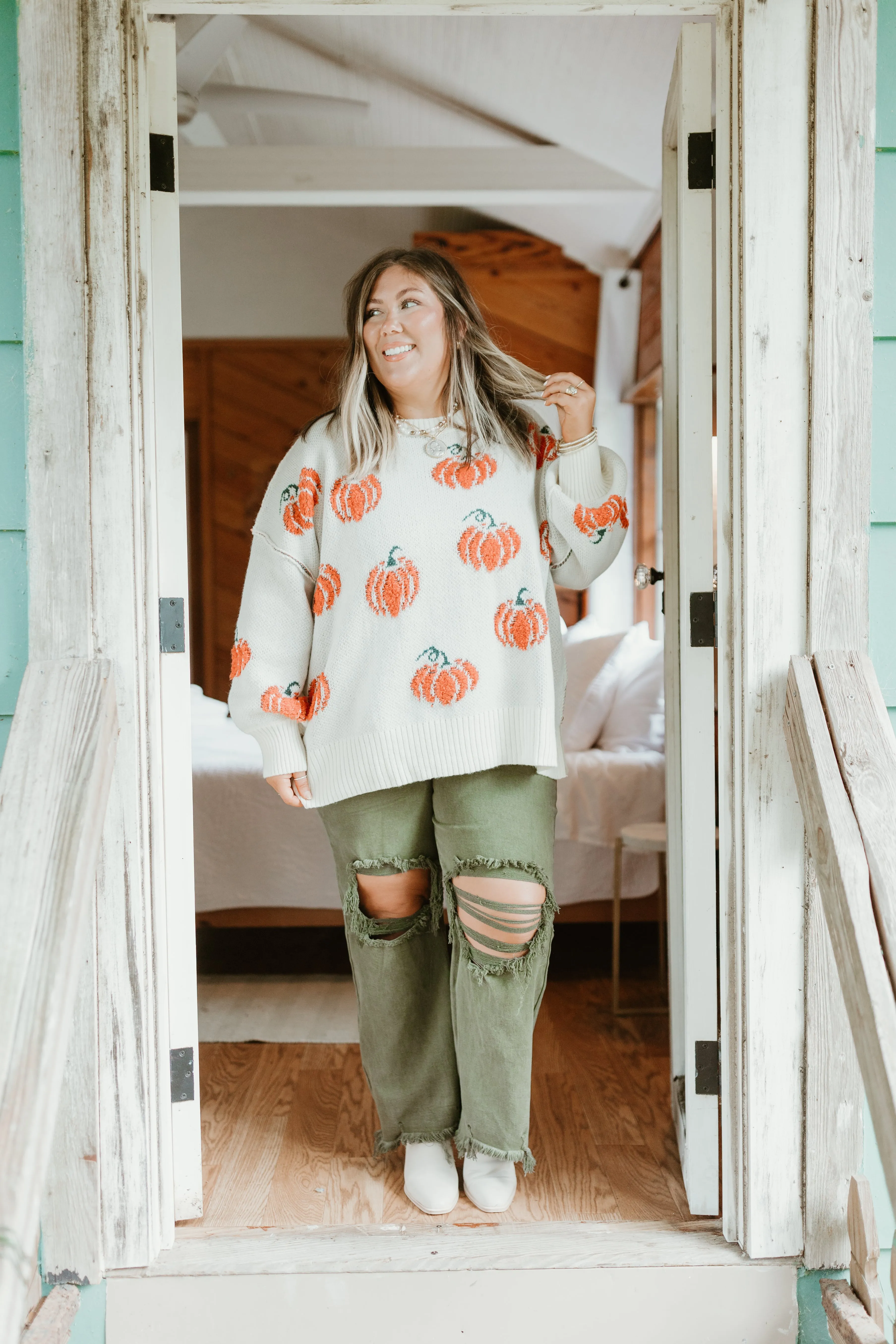 Cream and Orange Pumpkins All Over Sweater